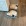two cats lying in a box on the floor