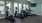 a gym with exercise equipment and windows
