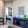 a living room with a wardrobe and a chair