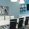 a work room with a table and chairs