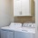 a white washing machine in a closet