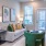 a living room with a couch and chairs