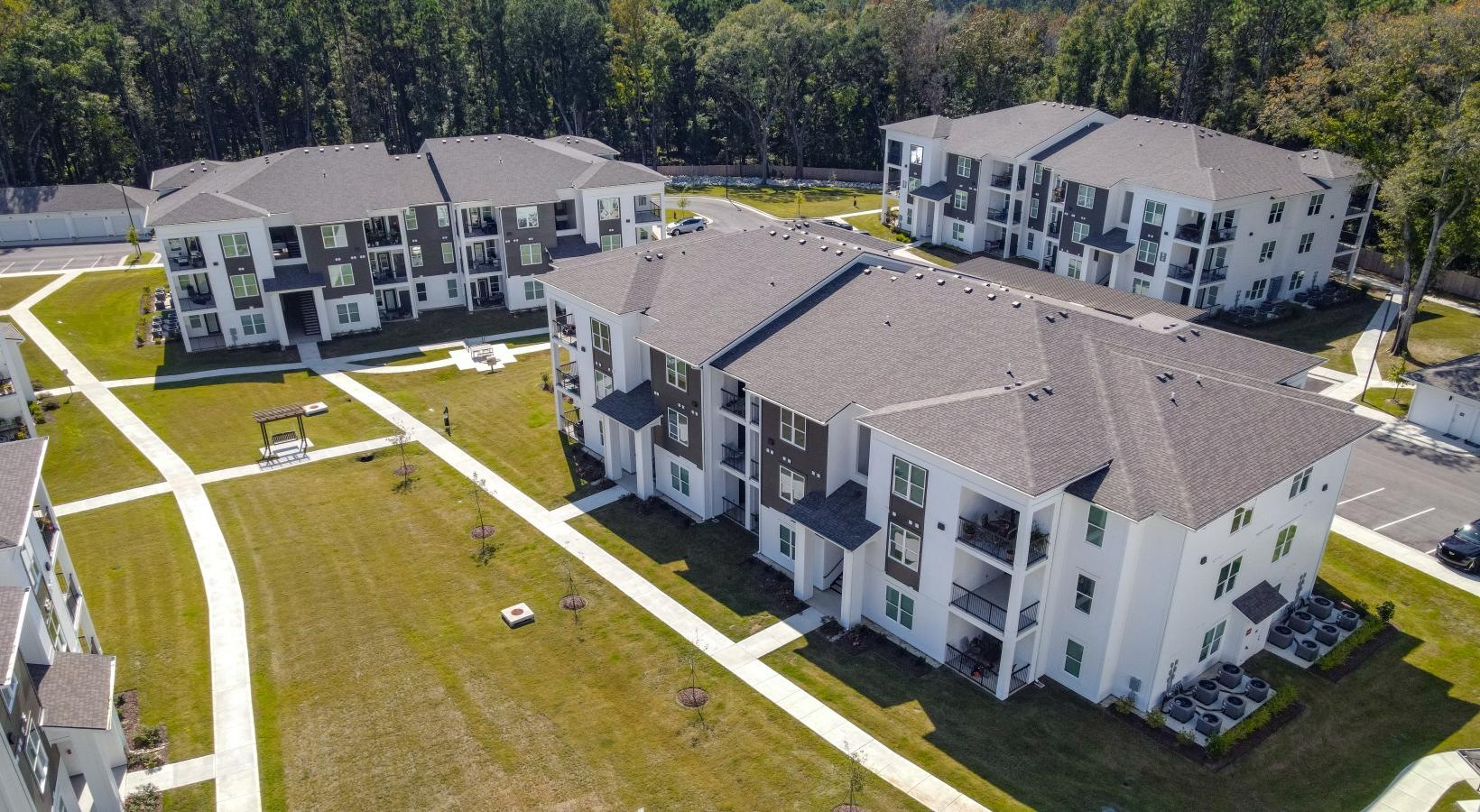Find your perfect fit at The Flats at East Bay a high angle view of a white group of buildings
