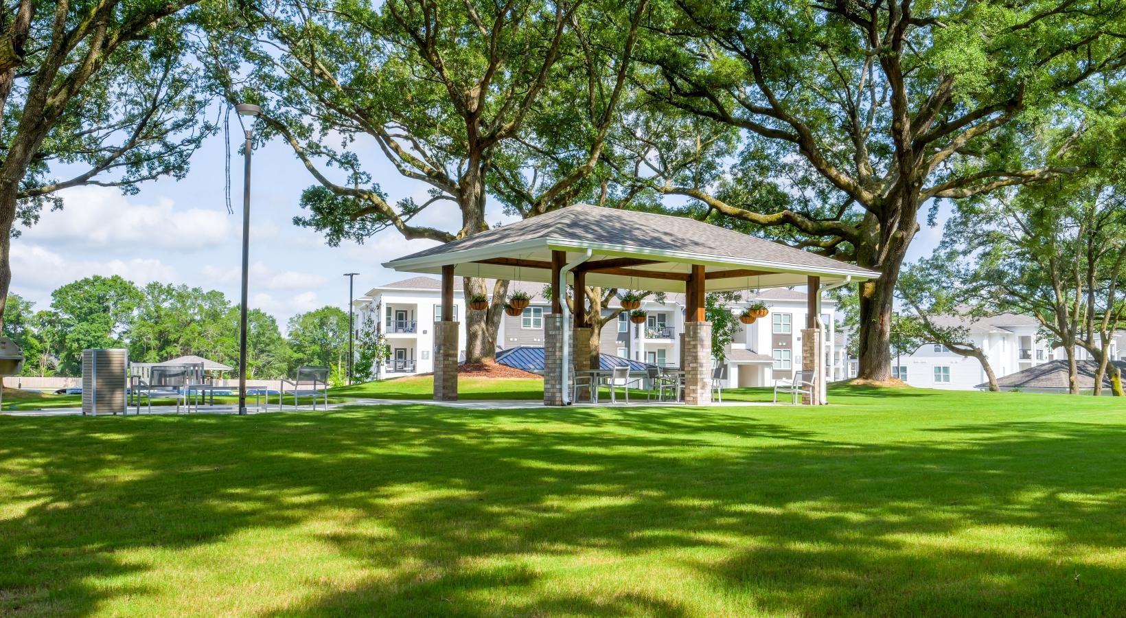Settle into comfort at The Flats at East Bay a gazebo in a park