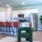 a kitchen island and a dining table and chairs